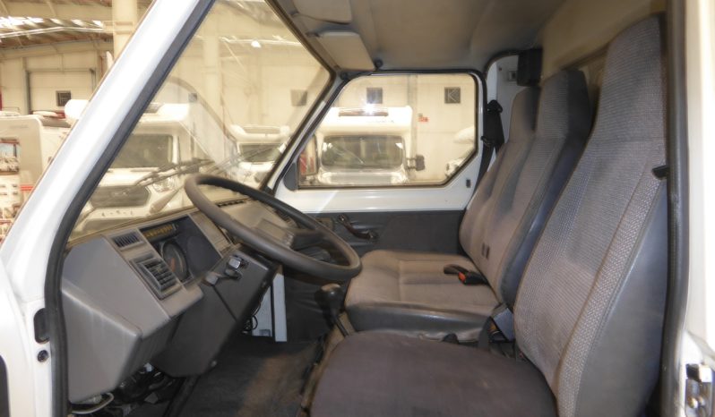 
								NISSAN Trade 2.8d 75 CV. caja cerrada. lleno									