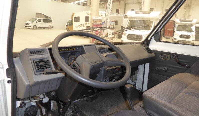 
								NISSAN Trade 2.8d 75 CV. caja cerrada. lleno									