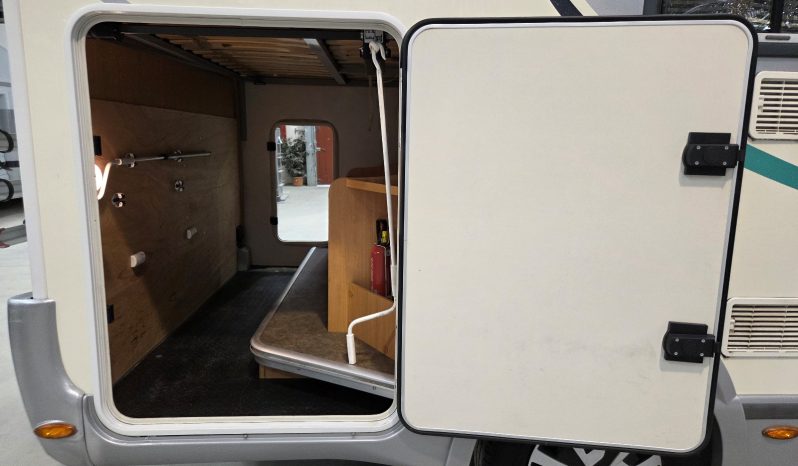 
								CHAUSSON FLASH PERFILADA COMPACTA CAMA TRANSVERSAL ELEVABLE + GARAJE lleno									